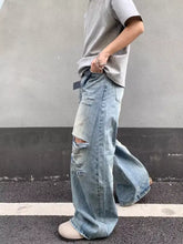 Men’s light-wash distressed wide-leg jeans with ripped knees in full size plus size denim design