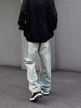 Light-wash denim men’s full size distressed wide-leg jeans with relaxed straight leg cut for plus size wear