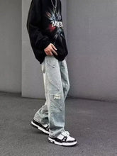 Men’s light-wash denim wide-leg jeans with distressed patches full size plus size wide-leg jeans offer