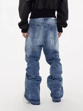 Men’s full size distressed wide leg jeans in washed blue denim with relaxed fit and frayed hems