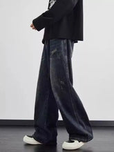 Men’s full size dark-wash denim wide leg jeans with a relaxed fit and subtle distressed details plus size