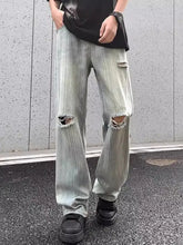 Men’s light-wash denim wide-leg jeans with distressed ripped knees and a slightly stretchy relaxed fit in full size plus
