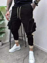 Men’s full size drawstring joggers in black with pockets