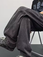 Men’s dark gray denim wide leg jeans with drawstring waist and visible stitching in full plus sizes