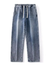Men’s full size blue denim jogger pants with relaxed fit and white drawstring waistband wide leg jeans plus size