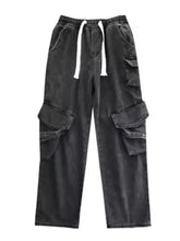 Men’s full size black denim wide leg cargo jeans with white drawstrings and multiple large pockets