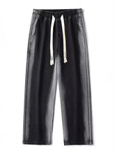 Men’s plus size black denim wide leg jeans with faded wash and contrasting white drawstring full size joggers