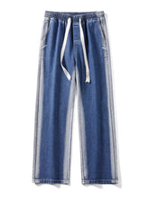 Men’s plus size blue denim wide leg jeans with light gray side stripes and white drawstring full size jogger pants