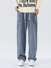 Men’s light-wash denim wide leg jeans with white drawstrings and front pockets plus size drawstring wide leg pants