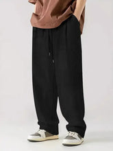 Mens black pleated drawstring wide leg pants plus size relaxed fit