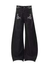 Men’s black denim wide leg jeans with white embroidered swirl patterns on back pockets and waistband size embroidered wide leg