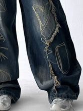 Men’s full size dark blue denim jeans with frayed hem wide leg and distressed beige embroidered heart and cup patches