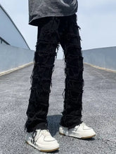 Men’s plus size slim-fit jeans in black distressed denim with frayed ripped detailing made from premium cotton