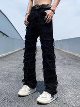 Men’s black distressed slim-fit jeans with frayed layered cutouts made from premium cotton in plus size