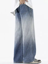 Men’s full size gradient wash wide leg jeans in faded blue denim with classic stitching details