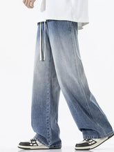 Men’s full size gradient wash wide leg light-wash denim jeans with white drawstring waist in relaxed fit