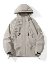 Beige hooded windproof outdoor jacket plus size with adjustable drawstrings zipper closure and multiple pockets with toggles