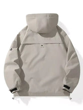 Beige men’s full size hooded windproof outdoor jacket plus size with sleek design and black accents on cuffs and drawstrings