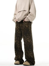 Men’s full size wide leg jeans in soft brown leopard print fabric with a loose fit and draping texture