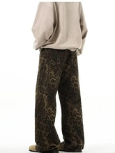 Men’s full size leopard print wide leg jeans in brown and black with plus size fit and stylish wide leg design
