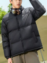 Men’s black lightweight packable zip up puffer jacket with quilted panels and hood in full and plus sizes