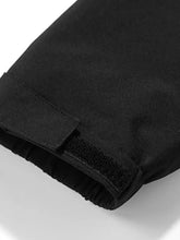 Black fabric sleeve with velcro closure and ribbed cuff on men’s full size long sleeve hooded windbreaker jacket plus size