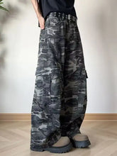 Men’s full size loose fit camo cargo jeans in dark gray and black with multiple pockets and durable fabric
