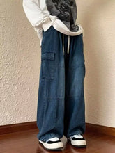 Men’s blue denim cargo jeans with multiple large pockets and drawstring waist loose fit cargo style plus size