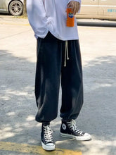 Men’s black corduroy loose fit drawstring joggers with white drawstrings and elastic cuffs plus size design