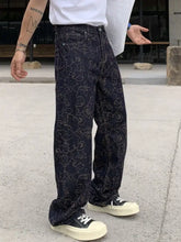 Men’s dark-wash loose fit jeans with intricate white embroidered floral pattern in full size plus fit jeans