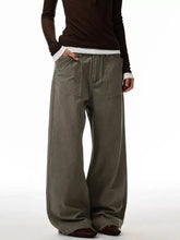 Men’s olive green wide-leg denim jeans offer a loose fit with frayed hems in plus size for relaxed comfort