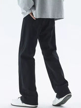 Men’s black corduroy loose fit jeans with straight legs and rolled cuffs in full size plus size fit jeans