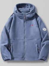 Men’s blue fleece hooded jacket with zipper front, side pockets, and embroidered patches for outdoor fleece use