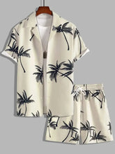 Cream-colored men’s full size button-up shirt and shorts set with black palm tree print in plus size design