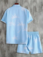 Men’s full size palm print button up shirt and shorts set in light blue with white palm tree pattern for casual wear