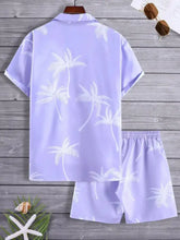 Lavender short-sleeved men’s full size palm print button up shirt with white palm tree print on wooden hanger