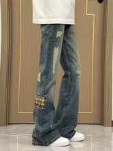 Men’s distressed blue denim wide-leg jeans with patchwork embroidery on thigh for everyday wear plus size