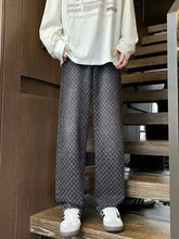 Men’s plus size dark gray wide-leg jeans with subtle geometric pattern and soft fabric texture in relaxed fit