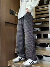 Men’s plus size dark gray patterned wide-leg jeans with a subtle geometric design for comfortable style