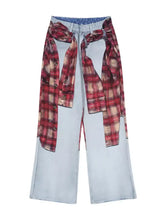 Men’s light-wash denim plaid patchwork wide leg jeans with a red and beige plaid patchwork wide shirt tied around waist