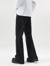 Men’s black wide-leg trousers with relaxed fit and subtle front pockets in full size pocketed bootcut jeans style