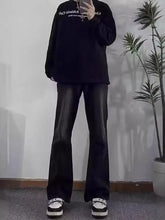 Men’s black pocketed flare jeans with smooth reflective finish in full size plus size flare jeans style