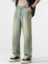 Men’s light green faded denim relaxed fit jeans with full size pockets and a straight-leg cut for plus size