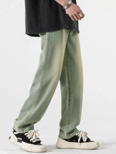 Men’s olive green wide-leg denim pants with full size pockets and relaxed fit jeans for plus size comfort