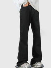 Men’s black raw hem flare jeans with relaxed fit and subtle stitching in full size plus size denim material