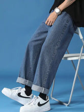 Men’s blue denim jeans with relaxed fit cuffed hem and rolled cuffs in full size plus size options