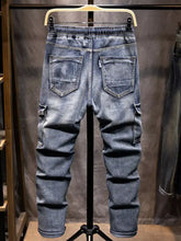 Men’s blue denim relaxed fit drawstring jeans with cargo pockets and elastic waistband plus size