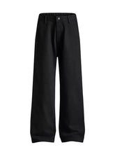 Black wide-leg trousers in soft textured fabric with minimalist design and button closure perfect for relaxed fit jeans