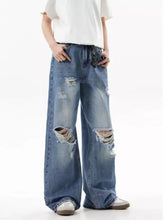 Men’s full size blue denim ripped wide leg jeans with distressed details in plus size design
