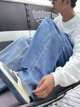 Men’s full size ripped wide leg jeans in blue denim with relaxed fit and frayed cuffs wide leg jeans